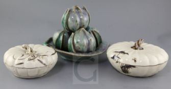 A Chinese Shiwan pottery model of four peaches in a dish and two porcelain gourd shaped boxes and