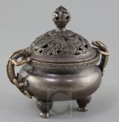 A Chinese bronze ding censer and cover, applied with a pair of chi-dragon handles on paw feet, the