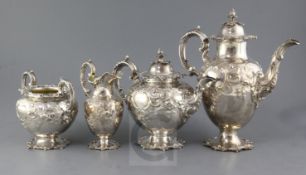 A Victorian silver four piece tea and coffee service by Edward & John Barnard, of ovoid form with