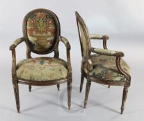 A set of six Louis XVI style stained beech fauteuils, with foliate tapestry woven upholstery, part