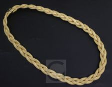 A modern textured 18ct gold interwoven necklace, 38cm.