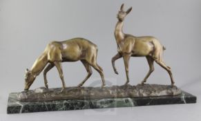 Irénée Rochard (1906-1984). A French Art Deco bronze group of two deer, signed on the naturalistic