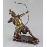 A Japanese bronze and parcel gilt figure of a kneeling archer, signed Yoshimitsu, Meiji period,