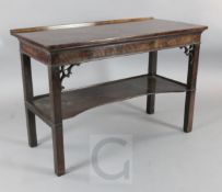 A George III mahogany serving table, with rectangular top, concave understage and squared legs, W.