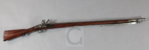 A Brown Bess flintlock musket, c.1800, lock stamped Warranted with elephant & castle, barrel