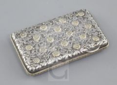 A late 19th/early 20th century continental parcel gilt silver card case?, decorated with scrolling