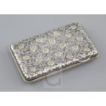 A late 19th/early 20th century continental parcel gilt silver card case?, decorated with scrolling