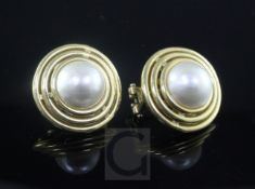 A modern pair 18ct gold and mabe pearl earrings, of concentric circle design.