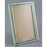 An early 20th century continental silver and two colour enamel mounted rectangular photograph frame,