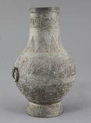 A Chinese archaic bronze ritual wine vessel, Hu, Eastern Zhou dynasty, 5th-3rd century B.C., cast in