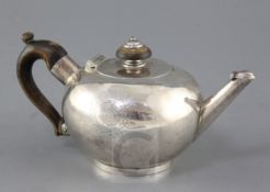 A rare George I Britannia standard silver bullet shaped teapot by Pierre Platel, (in 1703, Paul de