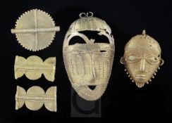A Baule or Akan people Ivory Coast gold pendant mask, 1.75in. three gold necklace segments and a