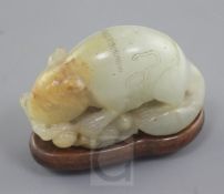 A Chinese pale celadon and russet jade figure of a tree shrew or squirrel, 18th / 19th century,