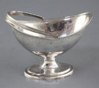 A George III silver bright cut oval boat shaped pedestal sugar basket, by William Abdy II, London,