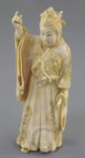 A Japanese ivory figure of a courtier, Meiji period, signed Masatoshi, clutching a sword in his left