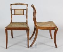 A set of eight Regency rosewood dining chairs, with ropetwist cresting rails, caned spars and