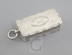 A Victorian engine turned silver rectangular combination vinaigrette/vesta by Aston & Son, with