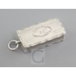 A Victorian engine turned silver rectangular combination vinaigrette/vesta by Aston & Son, with