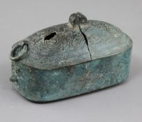 A Chinese archaic bronze portable lamp, Han dynasty, 2nd century B.C.- 2nd century A.D. of oblong