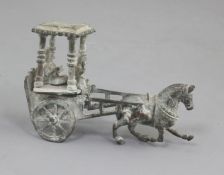 A Chinese archaic bronze model of a horse and carriage, Han dynasty, 2nd century B.C.-2nd century