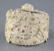 A Japanese 'thousand flower' ivory box and cover, early 20th century, profusely carved in high