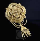 A Victorian 15ct gold tassel drop brooch, of quatrefoil shape with textured decoration, ropetwist