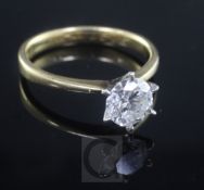 A gold and solitaire diamond ring, the diamond measuring 6.6mm in diameter, size M.