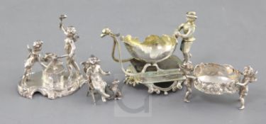 Four late 19th/early 20th century German silver miniature figural groups, three with English