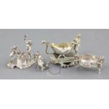 Four late 19th/early 20th century German silver miniature figural groups, three with English