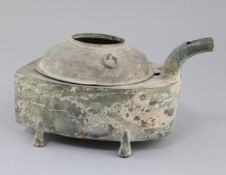 A Chinese archaic bronze steamer vessel, in two parts, Xian, Han dynasty, 206 B.C.-220 A.D., of boat