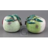 A pair of Chinese enamelled porcelain models of peaches, 19th century, each applied with leaf