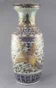 A large Chinese celadon ground baluster vase, mid 19th century, moulded and decorated in