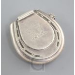 A Victorian silver horse shoe shaped vesta case by Thomas William Dee, with engraved crest and