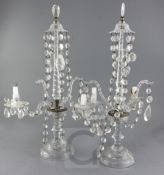 A pair of facet cut glass twin light and metal mounted lustre candelabra, 19th century, with facet