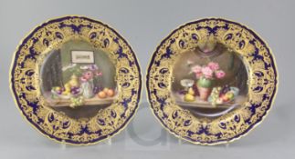 William A. Hawkins for Royal Worcester. A pair of cabinet plates, c.1917, each painted with a