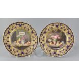 William A. Hawkins for Royal Worcester. A pair of cabinet plates, c.1917, each painted with a