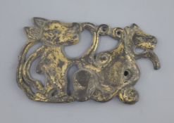 A Chinese gilt bronze harness plaque, Ordos type, Inner Mongolia, 3rd-1st century B.C., in the