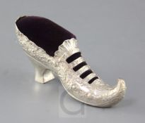 A late 19th/early 20th century German Hanau silver novelty slipper pin cushion, 16cm.