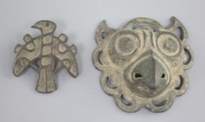 A Chinese archaic bronze 'owl-head' plaque, probably Han dynasty, 6.5cm, together with a bronze '