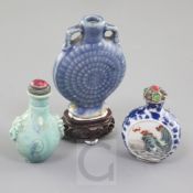 Three Chinese porcelain snuff bottles, 19th / early 20th century, the first painted in enamels