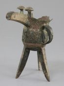 A Chinese archaic bronze tripod ritual wine vessel, Jue, Shang dynasty, 13th-12th century B.C.,