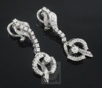 A pair of 1970's 18ct white gold and diamond set drop earrings, 41mm.