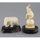 Two Japanese ivory figures of elephants, Meiji period, the first in standing pose, engraved two