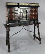 A late 17th / early 18th century rosewood, ebony and red tortoiseshell mounted vargueno on stand,