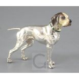 An Italian Saturno silver and enamel miniature model of a dog, height 11.2cm.