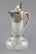 A late Victorian silver mounted glass claret jug by Horace Woodward & Co Ltd, with vineous