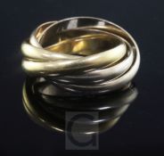 A Les Must de Cartier 18ct three colour gold Trinity quintuple hoop ring, signed and numbered