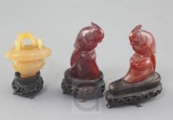 Three Chinese chalcedony carvings, late 19th century, the first in the form of a basket with