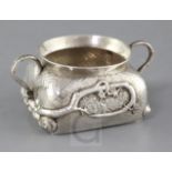 A late 19th/early 20th Japanese planished silver two handled sugar bowl, of squat form and decorated