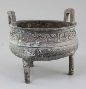 A large Chinese archaic bronze ritual food vessel, Ding, Western Zhou dynasty, 10th century B.C.,